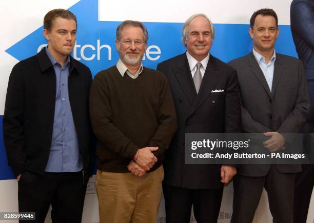 Actors Leonardo DiCaprio and Tom Hanks with director Steven Spielberg and Frank W. Abagnale during a press conference before the UK premiere of their...