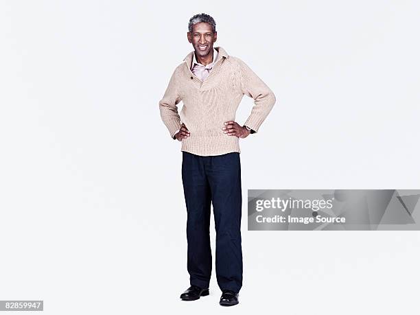 portrait of a mature man - hand on hip stock pictures, royalty-free photos & images