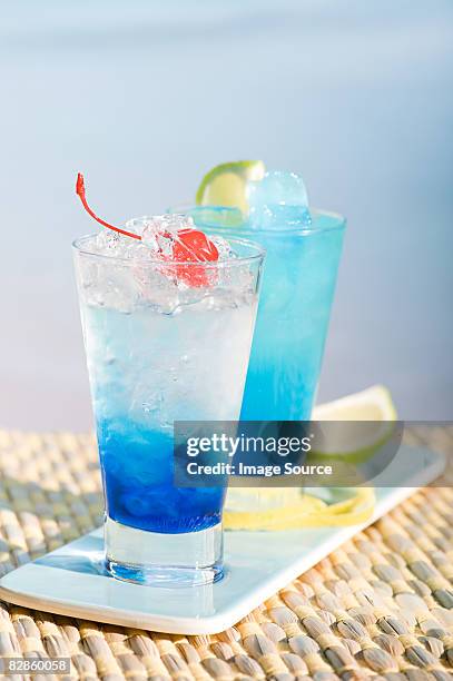 blue cocktails - blue lagoon imagens e fotografias de stock