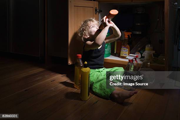 boy drinking cleaning product - deadly stock pictures, royalty-free photos & images