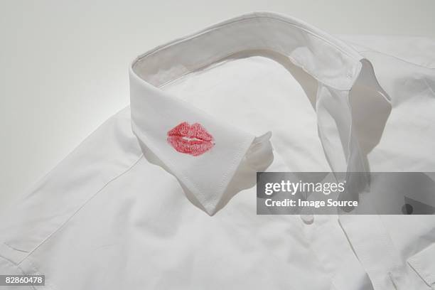 lipstick kiss on a collar - love triangle stock pictures, royalty-free photos & images