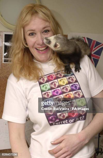 Karen Parker, Managing Director of Ferrets UK, at her offices in Milton Keynes, with her ferret, Bingo, after winning an Orange Small is Beautiful...