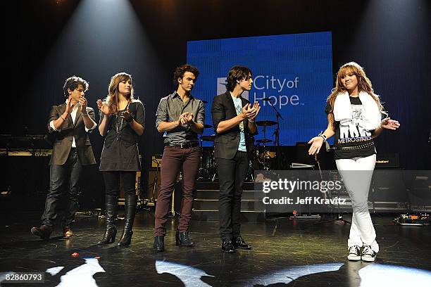 Nick Jonas, Demi Lovato, Kevin Jonas, Joe Jonas and Miley Cyrus at the City of Hope Benefit Concert with Miley Cyrus & Jonas Brothers at the Gibson...