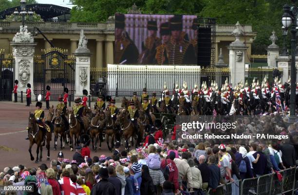 Gunners from the Royal Horse Artillery pass Buckingham Palace, London, during the celebrations for the Golden Jubilee of HM the Queen. In the...