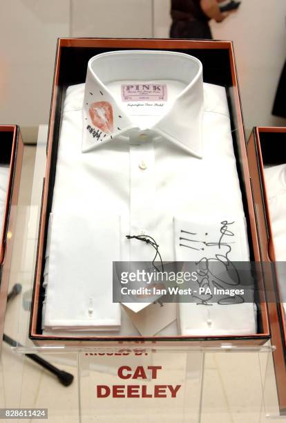 Shirt kissed and signed by TV presenter Cat Deeley at the Lipstick on you Collar auction for the Haven Trust at The Avenue, St James's Street in...
