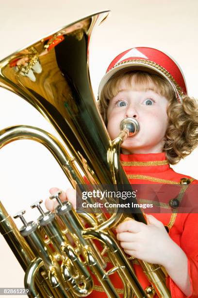 portrait of a girl playing the tuba - tuba imagens e fotografias de stock
