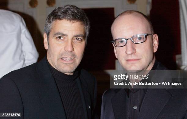 Actor George Clooney and director Steven Soderbergh arrive for the UK charity film premiere of their new film Solaris at the Electric Cinema in...
