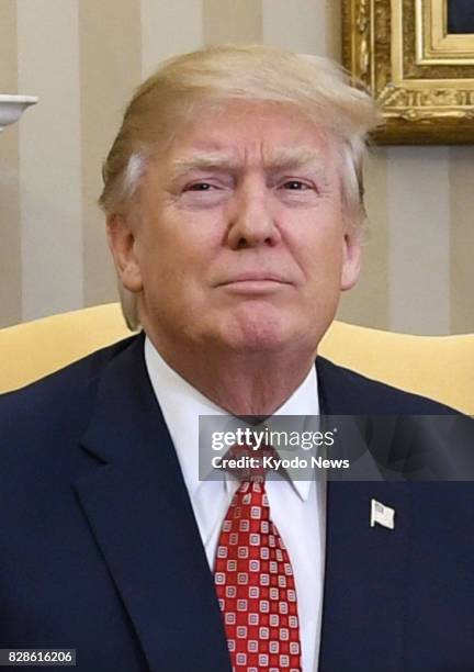 President Donald Trump, seen in this file photo, boasted of the strength of his country's nuclear arsenal and voiced hope on Aug. 9 that it will not...