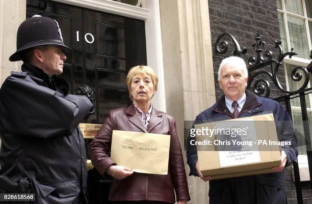 Councellor Lynda Hyde , flanked by resident Alan Hood from Saltdean, Sussex, stand outside 10 Downing Street. Clr Hyde handed in a 1600 strong signed...