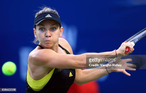 Simona Halep of Romania plays a shot against Magdalena Rybarikova of Slovakia during Day 5 of the Rogers Cup at Aviva Centre on August 9, 2017 in...