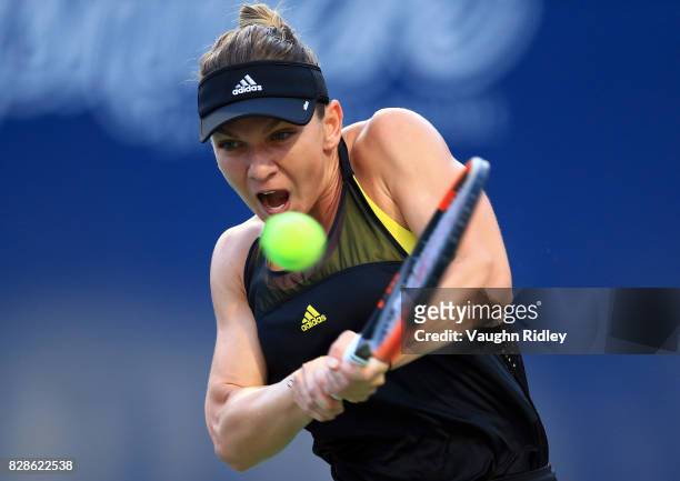 Simona Halep of Romania plays a shot against Magdalena Rybarikova of Slovakia during Day 5 of the Rogers Cup at Aviva Centre on August 9, 2017 in...