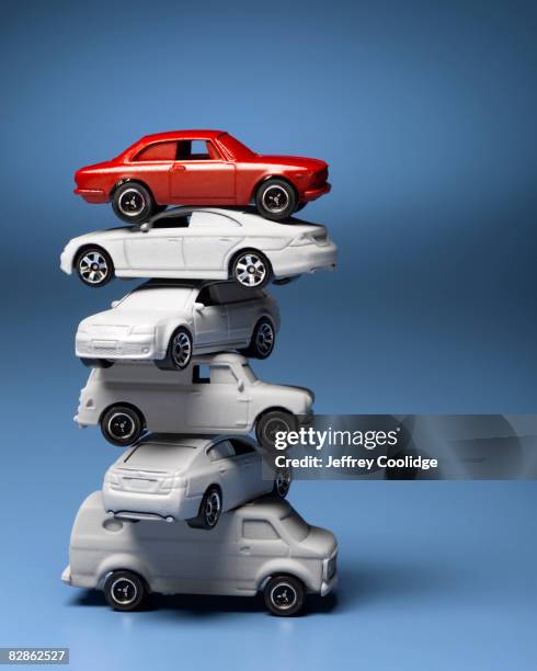 model cars stacked up - grupo médio de objetos imagens e fotografias de stock