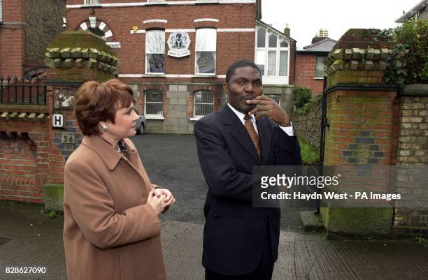 Former Eurovision Song Contest winner Dana and a member of staff from the Nigerian Embassy outside the embassy building in Dublin, . Dana Rosemary...