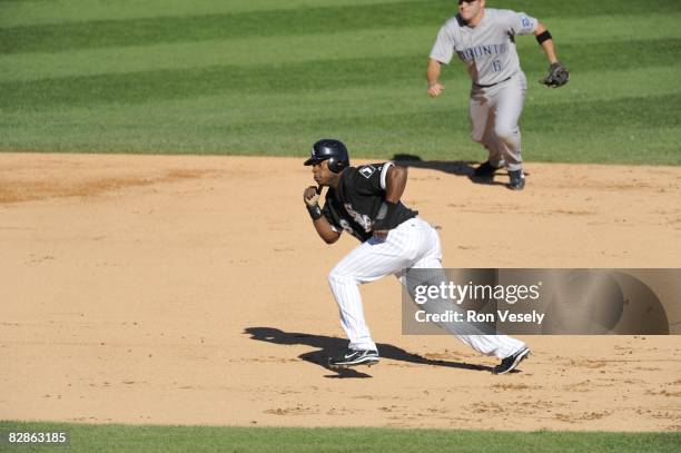 Jason Bourgeois of the Chicago White Sox runs towards third base during the game against the Toronto Blue Jays at U.S. Cellular Field in Chicago,...