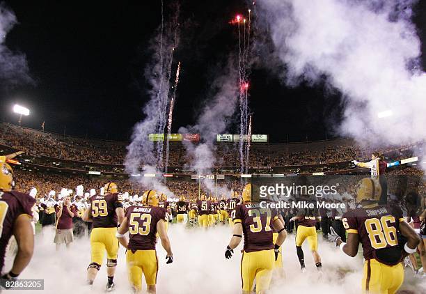 The Arizona State Sun Devils take the field before the game against the UNLV Rebels on September 13, 2008 at Sun Devil Stadium in Tempe, Arizona.