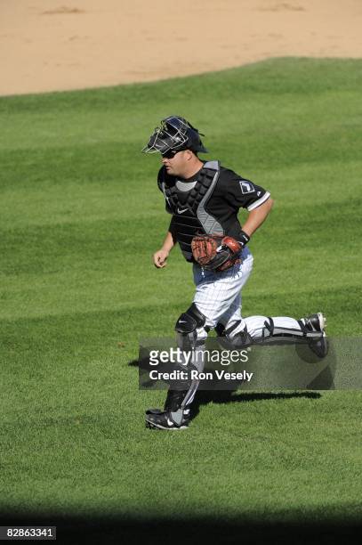 Paul Phillips of the Chicago White Sox runs back to home plate during the game against the Toronto Blue Jays at U.S. Cellular Field in Chicago,...