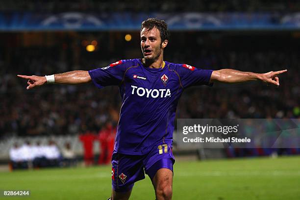 Alberto Gilardino of Fiorentina celebrates scoring the second goal during the UEFA Champions League Group F match between Lyon and Fiorentina at the...