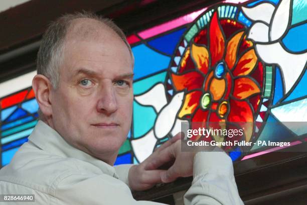 Geoff Fisher, headteacher St. Andrews Primary School in Soham, Cambridgeshire, unveils the new stained glass window at the school in remembrance of...