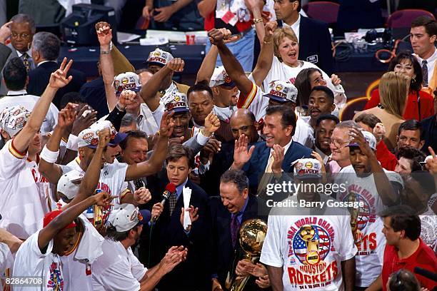 The Houston Rockets celebrate after winning Game Four of the 1995 NBA Finals against the Orlando Magic at the Summitt on June 14, 1995 in Houston,...