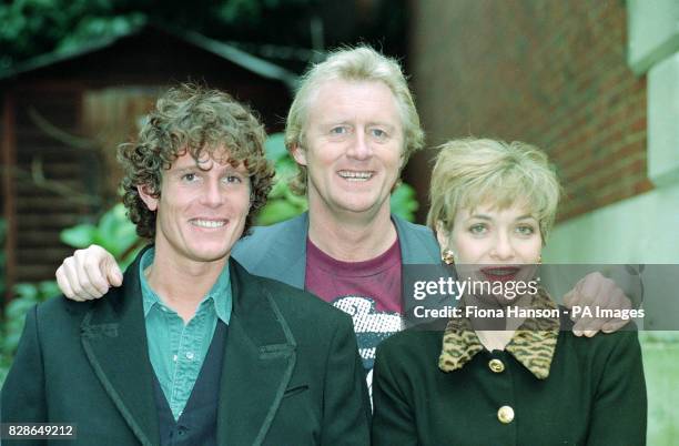 Radio and TV presenter Chris Tarrant with actor Jonathon Morris and presenter Fiona Armstrong during a photocall for Carlton TV at BAFTA.