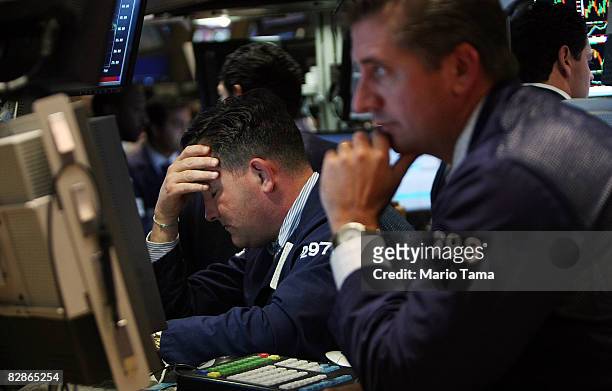 Traders work on the floor of the New York Stock Exchange September 17, 2008 in New York City. The Dow Jones Industrial Average closed down 449 points...