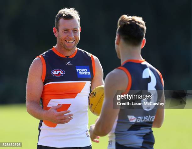 Steve Johnson of the Giants speaks to Stephen Coniglio of the Giants during a Greater Western Sydney Giants AFL training session at Sydney Olympic...