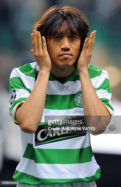 Celtic's Japanese midfielder Shunsuke Nakamura gestures before the kick off at the UEFA Champions League group E football match against Aalborg at...