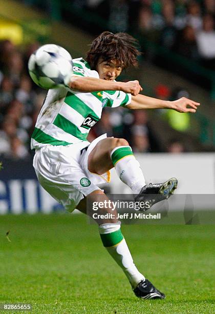 Shunsuke Nakamura of Celtic takes a free kick during the UEFA Champions League Group E match between Celtic and Aalborg at Celtic Park on September...