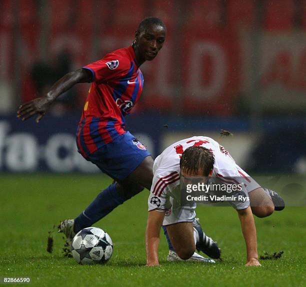 Philipp Lahm of Bayern and Antonio Semedo of Steaua battle for the ball during the UEFA Champions League Group F match between FC Steaua Bucuresti...
