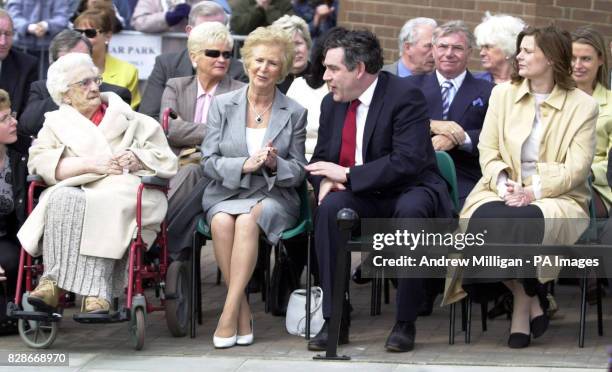 Chancellor Gordon Brown with his wife Sarah at the unveiling ceremony for football legend Jim Baxter at the mining village of Hill of Beath,...