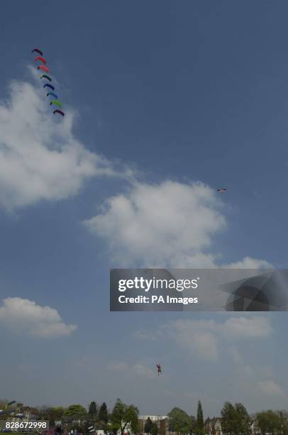"Pepsi" from "Team Adrenalize" soars 40 feet into the air using a "Flexi Foil Super 10" kite at the 6-th Streatham Common Kite Day, Streatham Common.