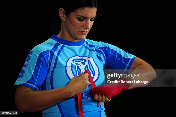 Superstar Gina Carano is seen during the Workout/Media Day with Kimbo Slice and Gina Carano at the Legends Mixed Martial Arts Training Center on...