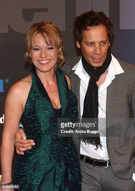 Andrea Ballschuh and her husband Jem Atai attend the Goldene Henne Award 2008 at the Friedrichstadtpalast on September 17, 2008 in Berlin, Germany.