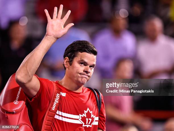 Milos Raonic of Canada walks off the court after his defeat against Adrian Mannarino of France during day six of the Rogers Cup presented by National...
