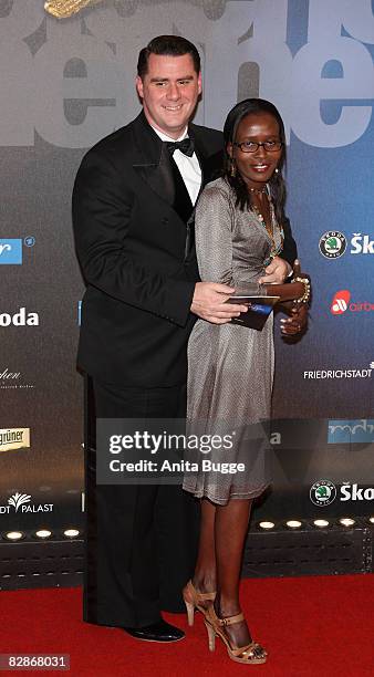 Musician Andrej Hermlin and his wife Joyce attend the Goldene Henne Award 2008 at Friedrichstadtpalast on September 17, 2008 in Berlin, Germany.