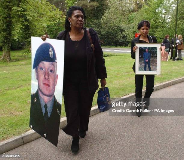 Glasme Davis and Deveen Clarke - the mother and wife respectively of Mario O'brian-Clarke, a soldier who died while serving at Deepcut Barracks in...