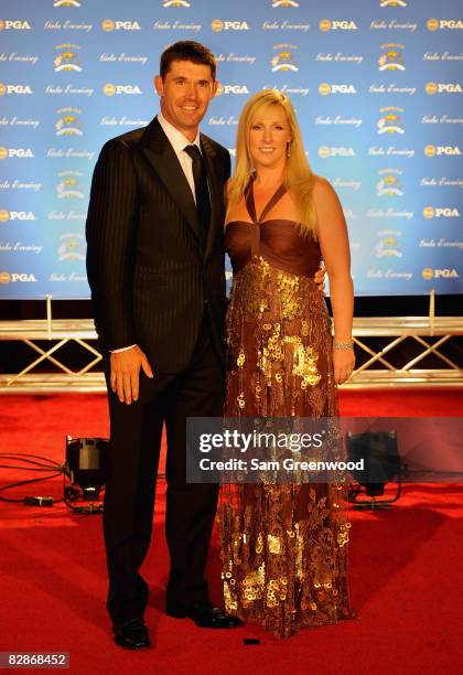 Padraig Harrington of Ireland and the European Ryder Cup team poses with his wife Caroline on the red carpet before the Ryder Cup Gala dinner prior...