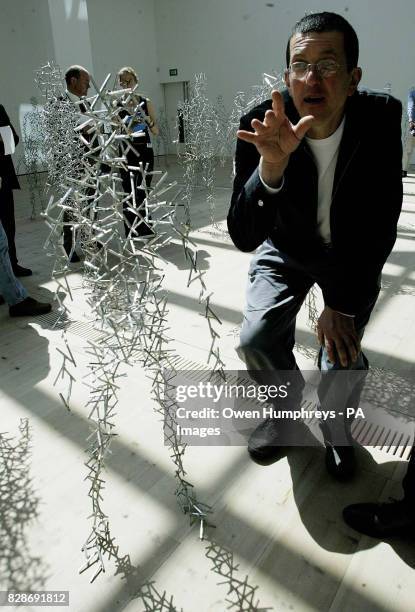 Sculpter and artist Antony Gormley, stands with his 'Domain Field' exhibition, which he unveiled at the Baltic Gallery in Gatehead. The exhibition of...