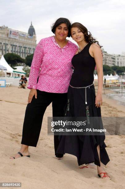 Director and screenwriter Gurinder Chadha and actress Aishwarya Rai on the beach at the Cannes film Festival to promote her new film 'Pride and...