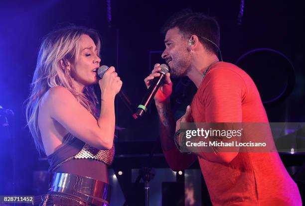 Singers Fey and Pedro Capo perform during HBO Latino x Pedro Capo: En Letra de Otro at La Marina Restaurant Bar Beach Lounge on August 9, 2017 in New...