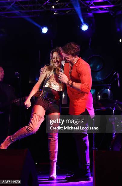 Singers Fey and Pedro Capo perform during HBO Latino x Pedro Capo: En Letra de Otro at La Marina Restaurant Bar Beach Lounge on August 9, 2017 in New...