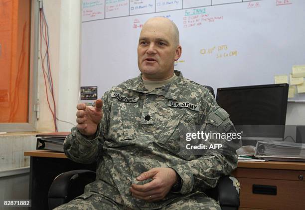 Army lieutenant colonel Thomas Hauerwas gestures as he speaks on September 15 2008, at Camp Speicher in the northern city of Tikrit some 180 kms from...