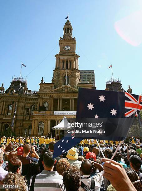 The public gather outside Sydney Town Hall during a welcome home parade for the Beijing 2008 Olympic Athletes on George Street on September 15, 2008...