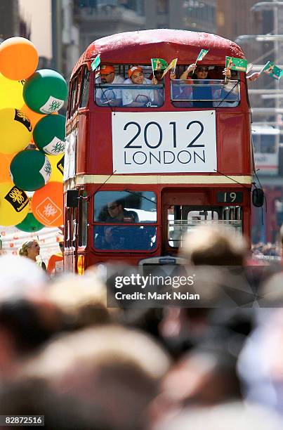 Bus makes its way along the parade route during a welcome home parade for the Beijing 2008 Olympic Athletes on George Street on September 15, 2008 in...