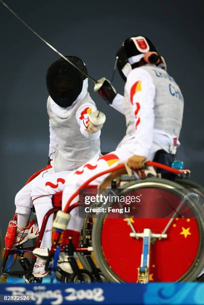 Zhang Chuncui and Zhang Wenxin of China compete in the quarterfinals of the Women's Individual Foil Category A at Fencing Hall of National Convention...