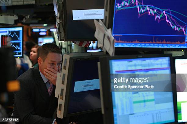 Trader works on the floor of the New York Stock Exchange September 15, 2008 in New York City. In afternoon trading the Dow Jones Industrial Average...
