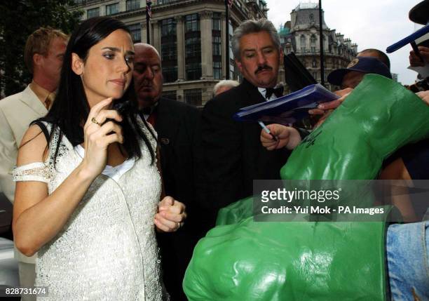 Jennifer Connelly signs autographs as she arrives at the premiere of The Hulk at the Empire cinema in London's Leicester Square.