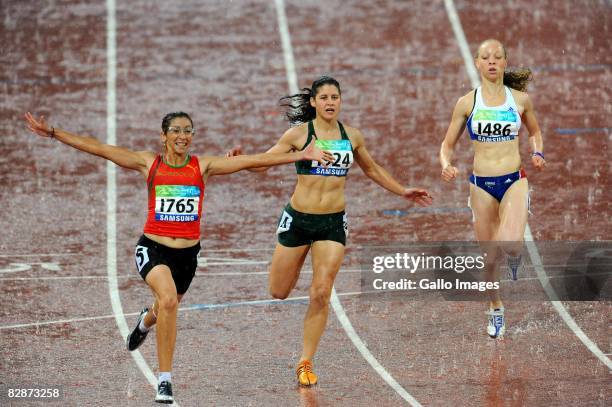 Sanaa Benhama of Marocco wins Gold, followed by Ilse Hayes of South Africa coming second, in the 100m T13 during day 10 of the 2008 Beijing...