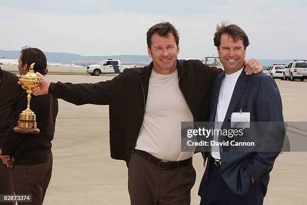 The USA team captain Paul Azinger greets Eurpoean team captain Nick Faldo at the Louisville International Airport prior to the 2008 Ryder Cup held at...