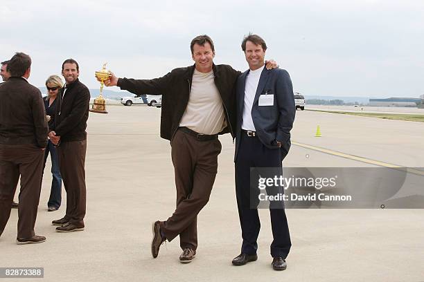 The USA team captain Paul Azinger greets Eurpoean team captain Nick Faldo at the Louisville International Airport prior to the 2008 Ryder Cup held at...